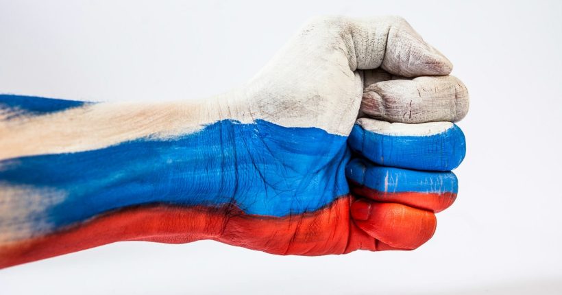 Photo by Elena Mozhvilo persons feet with blue paint
