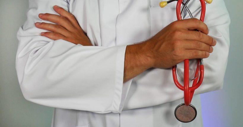 Photo by Online Marketing doctor holding red stethoscope